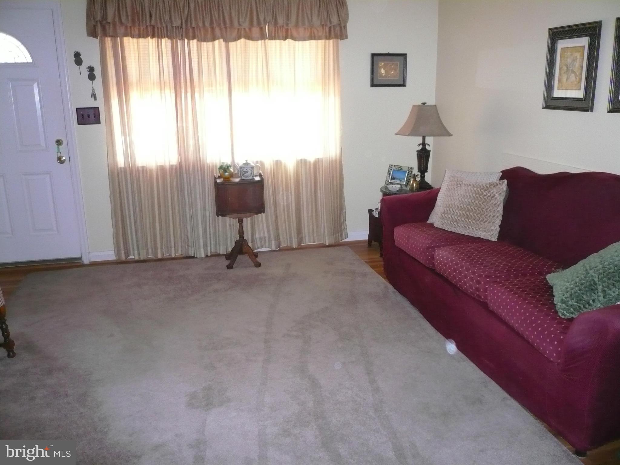 2018 Ormand Road Baltimore, MD 21222 - Photo 2 of 21 a living room with furniture and a window
