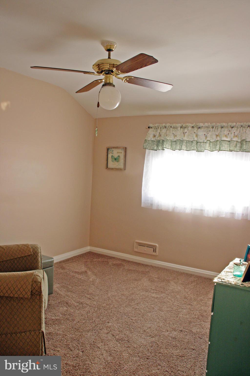 2018 Ormand Road Baltimore, MD 21222 - Photo 14 of 21 a view of a room with window and ceiling fan