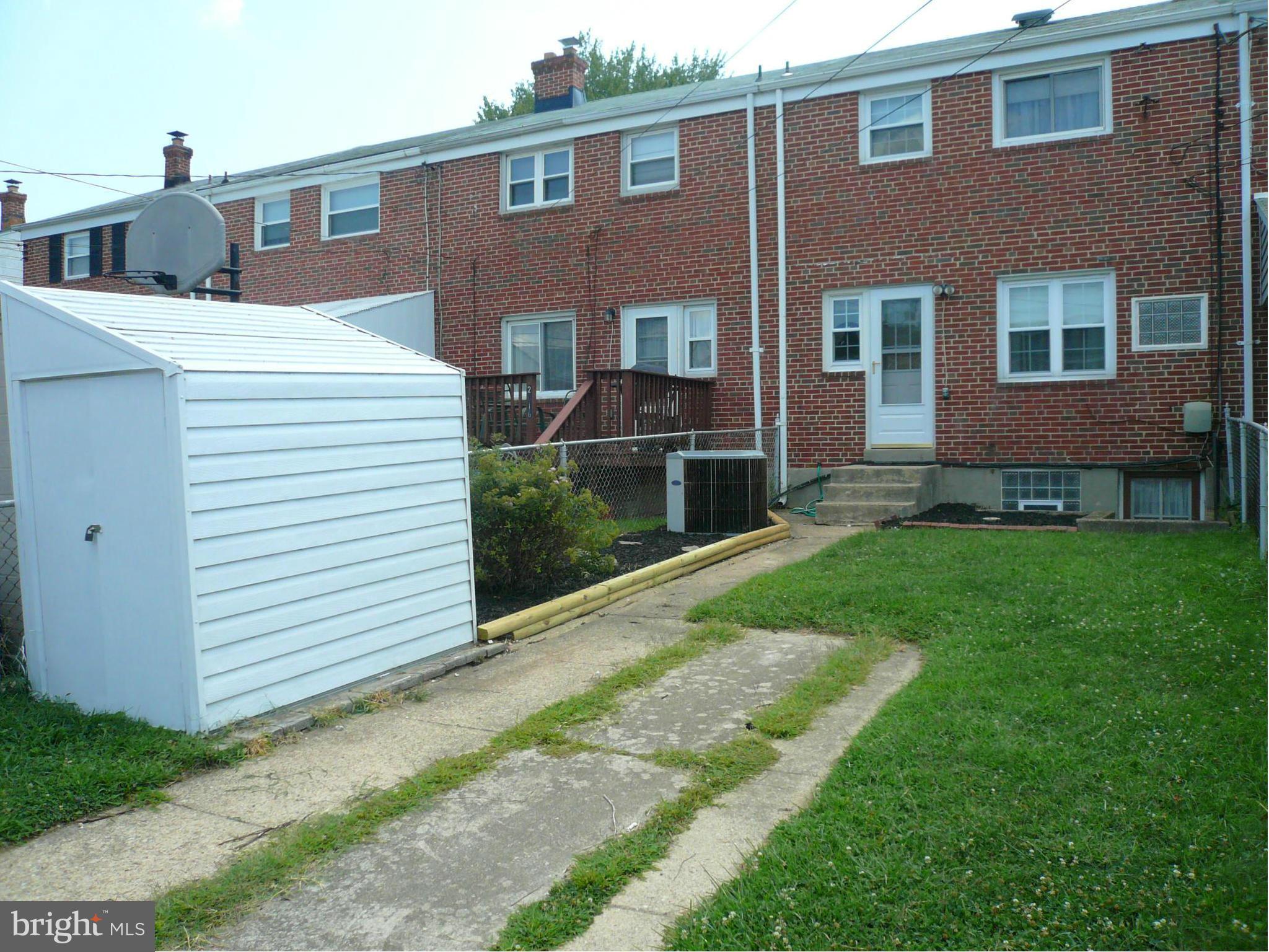 2018 Ormand Road Baltimore, MD 21222 - Photo 19 of 21 a view of a house with a yard