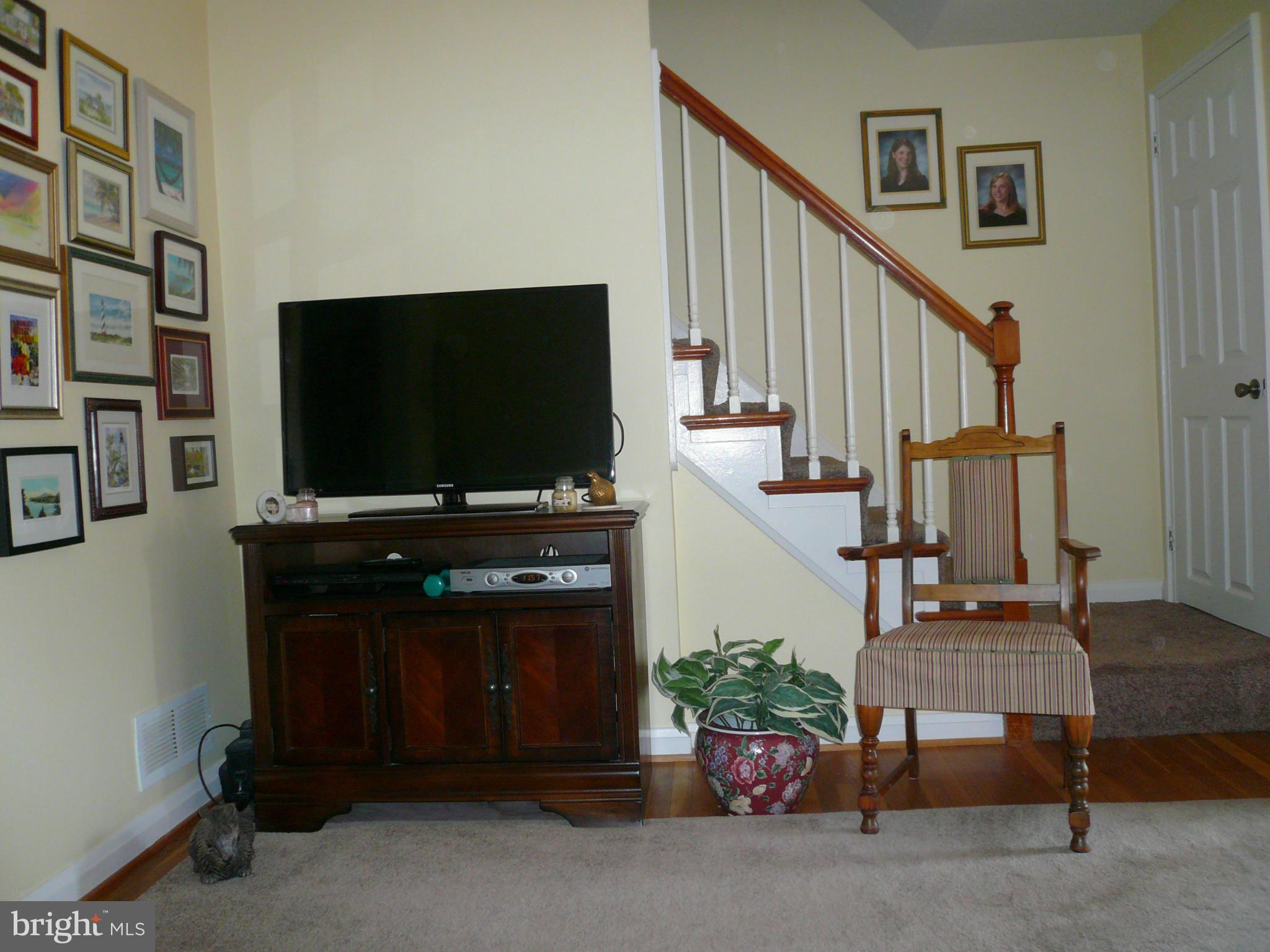 2018 Ormand Road Baltimore, MD 21222 - Photo 6 of 21 a living room with furniture and a flat screen tv