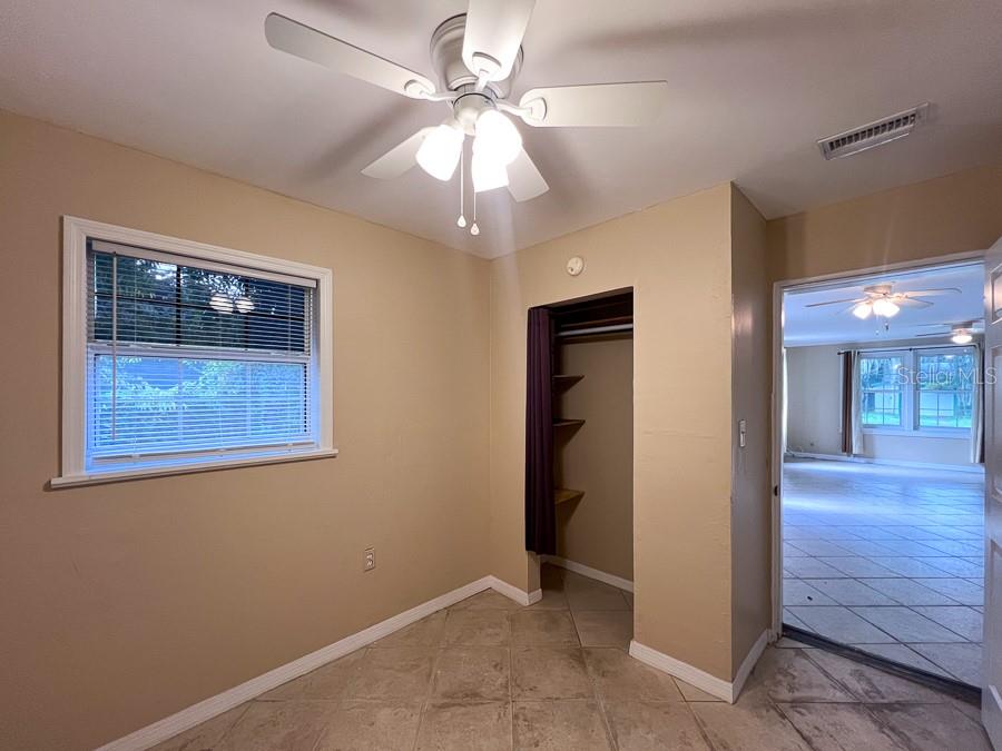 1033 Northwest 22nd Avenue Gainesville, FL 32609 - Photo 20 of 25 en view interior of the house and wooden floor