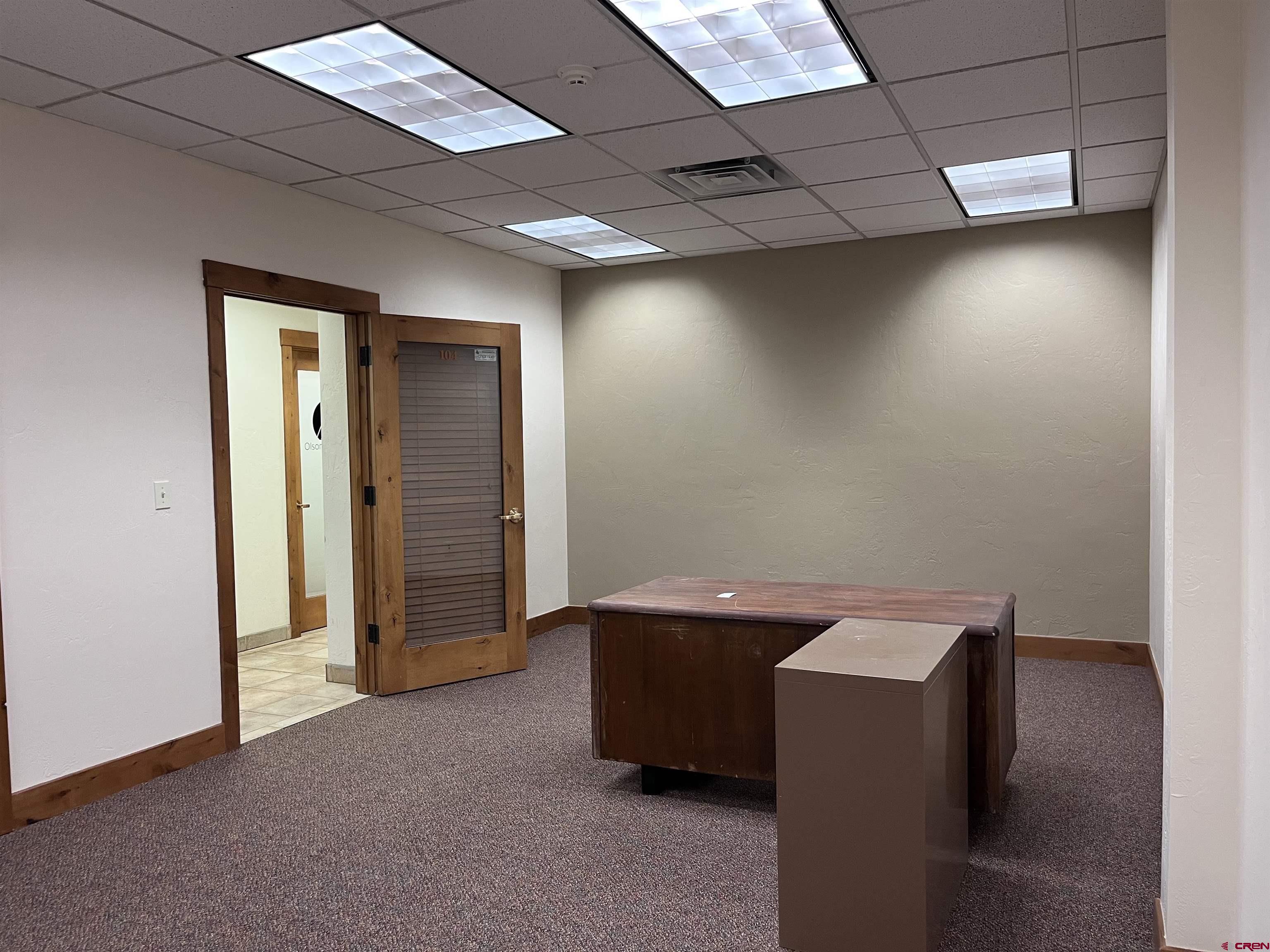 954 East 2nd Avenue, Unit 104 Durango, CO 81301 - Photo 4 of 14 a room with storage and utility