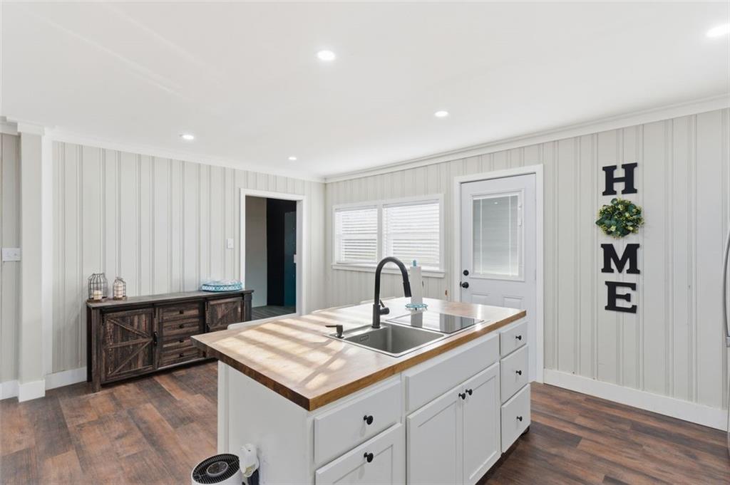 121 Ripley Avenue Adairsville, GA 30103 - Photo 12 of 43 a kitchen with a sink and cabinets