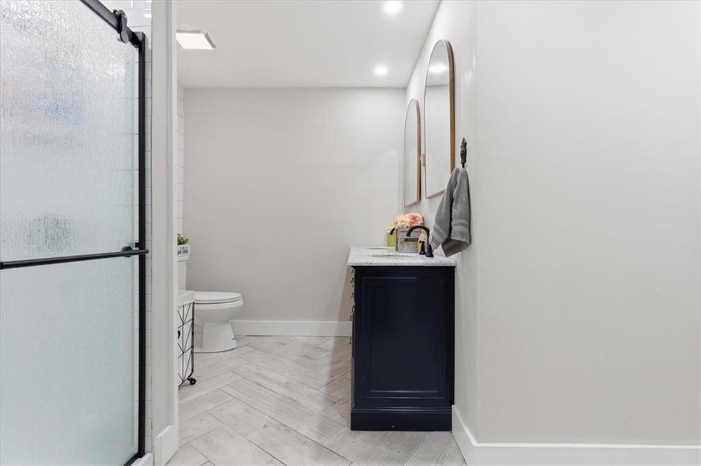 121 Ripley Avenue Adairsville, GA 30103 - Photo 17 of 43 a bathroom with a sink a toilet and shower