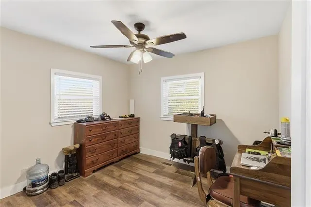 a bed room with furniture and a window