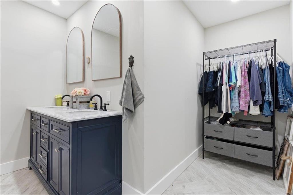 121 Ripley Avenue Adairsville, GA 30103 - Photo 20 of 43 a view of walk in closet with clothes