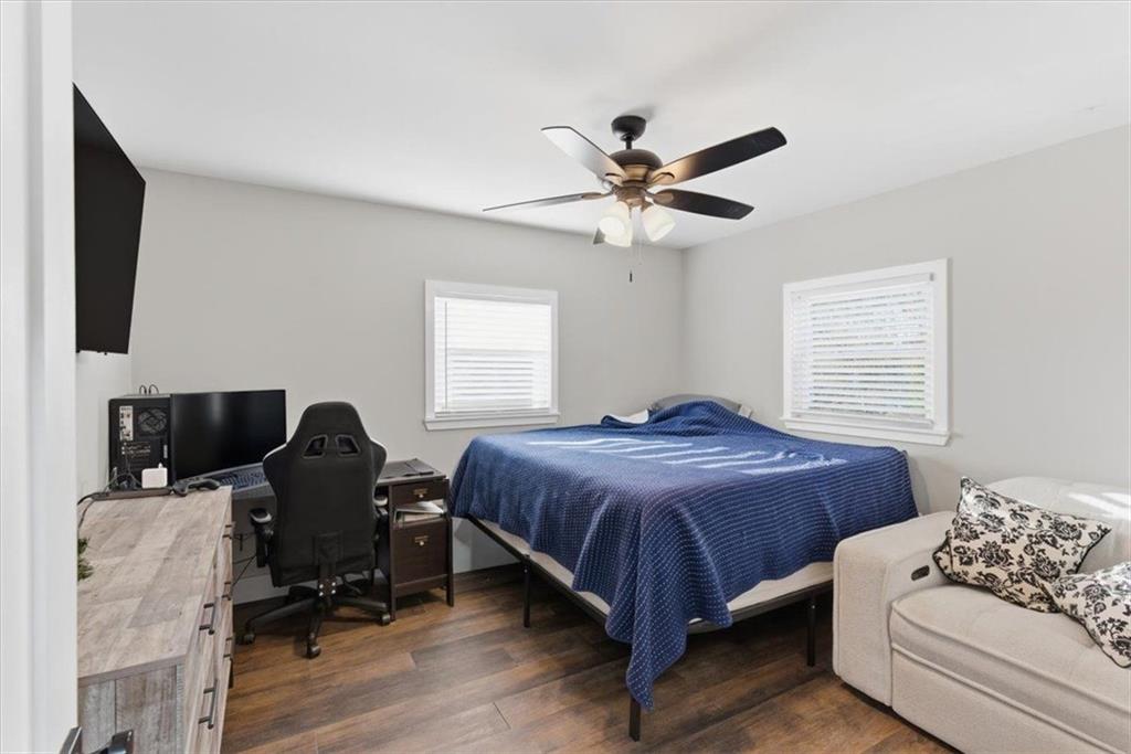 121 Ripley Avenue Adairsville, GA 30103 - Photo 21 of 43 a bedroom with a large bed and a window