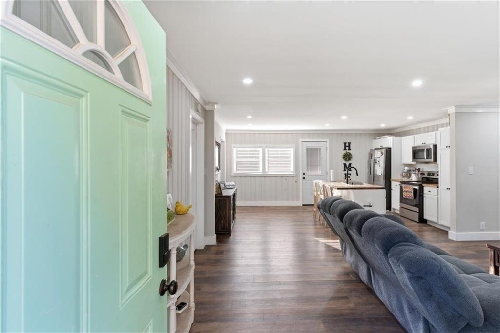 121 Ripley Avenue Adairsville, GA 30103 - Photo 3 of 43 a living room with furniture and a wooden floor