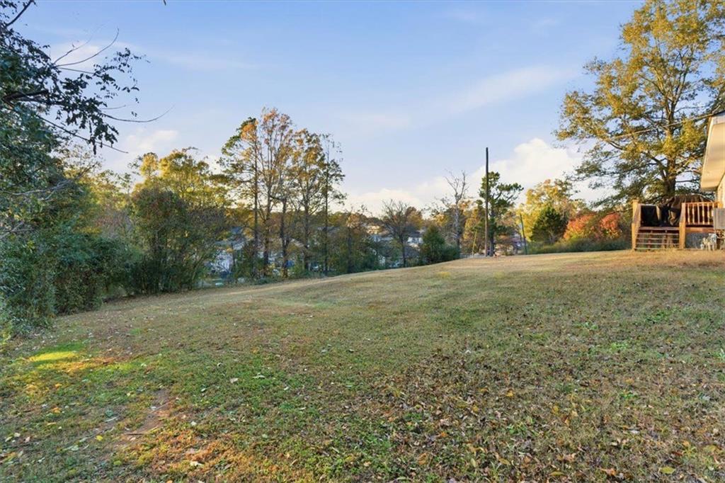 121 Ripley Avenue Adairsville, GA 30103 - Photo 31 of 43 a big yard with lots of green space