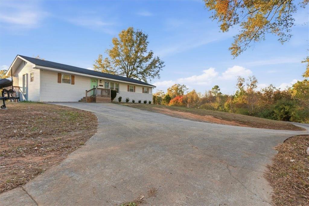 121 Ripley Avenue Adairsville, GA 30103 - Photo 36 of 43 a view of a house with a yard
