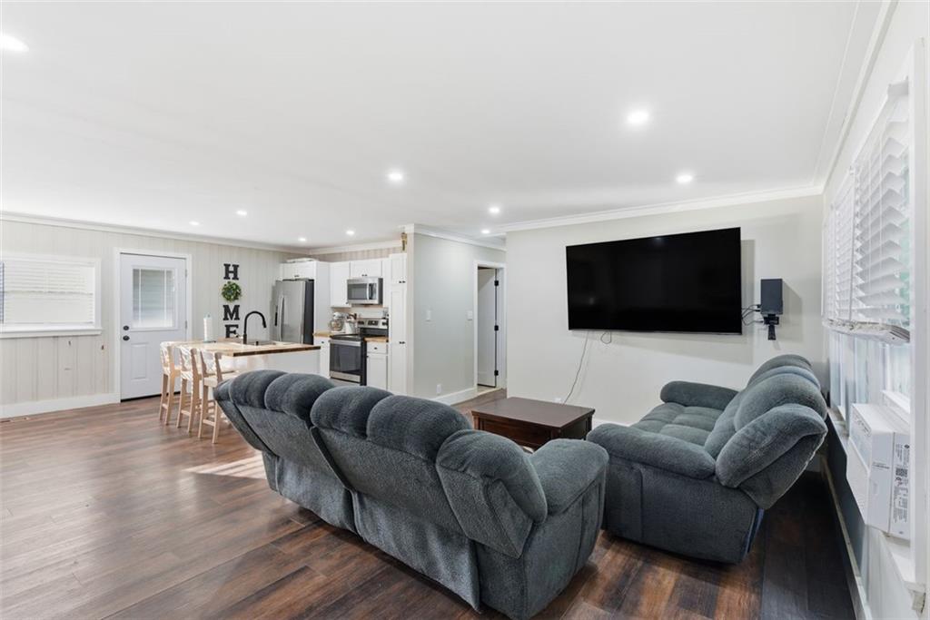 121 Ripley Avenue Adairsville, GA 30103 - Photo 4 of 43 a living room with furniture and a flat screen tv