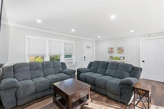 a living room with furniture and a couch