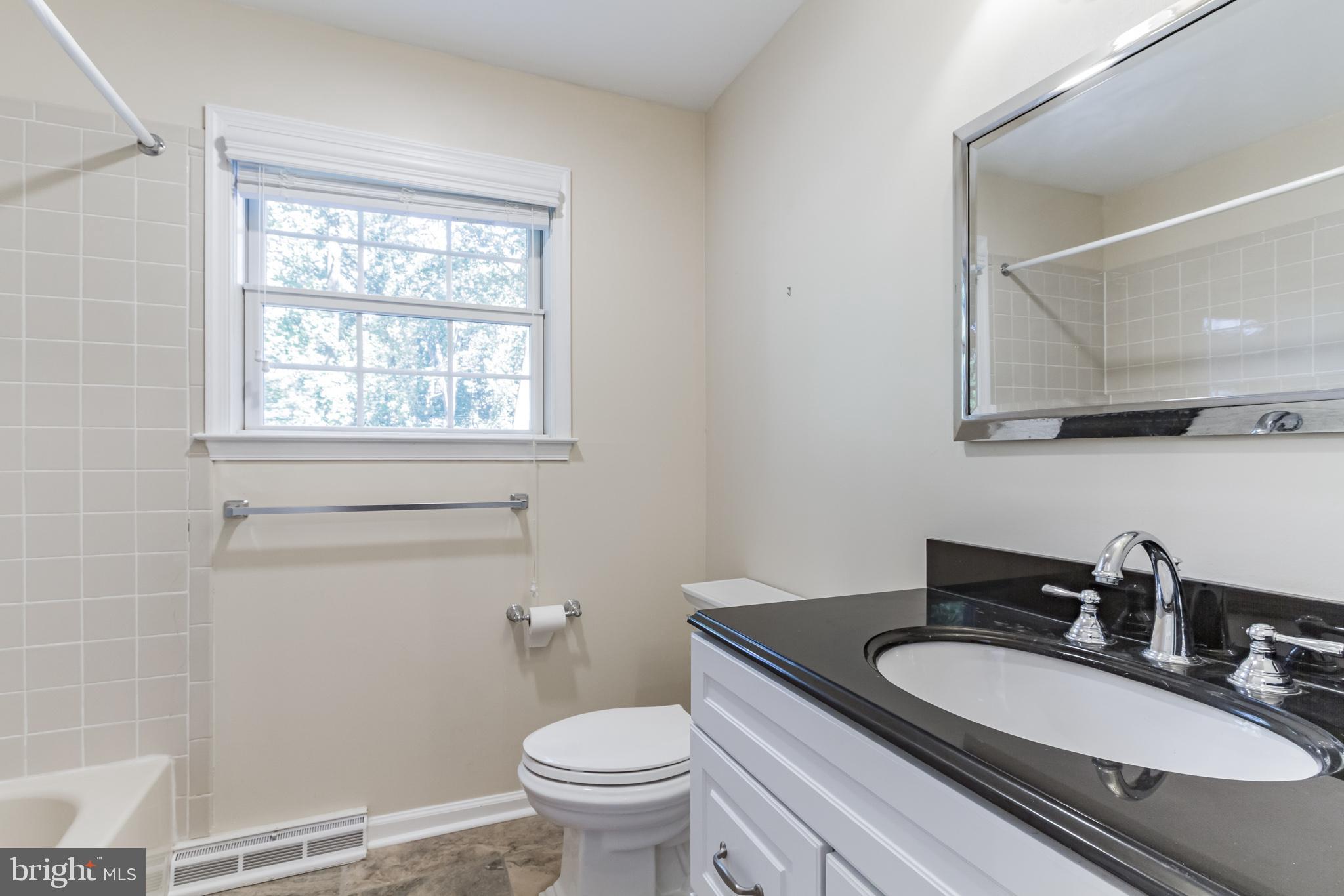 51 Summit Road Malvern, PA 19355 - Photo 33 of 39 Ceramic Tile Hall Bath With Granite Vanity