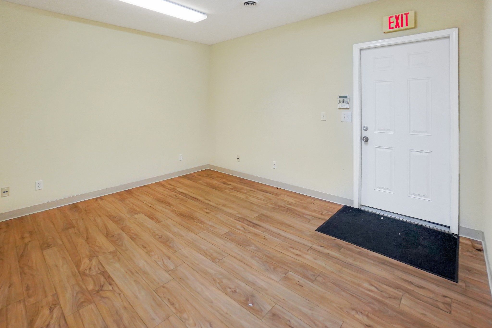 1225 Spring Street Dover, TN 37058 - Photo 13 of 47 a view of an empty room with wooden floor