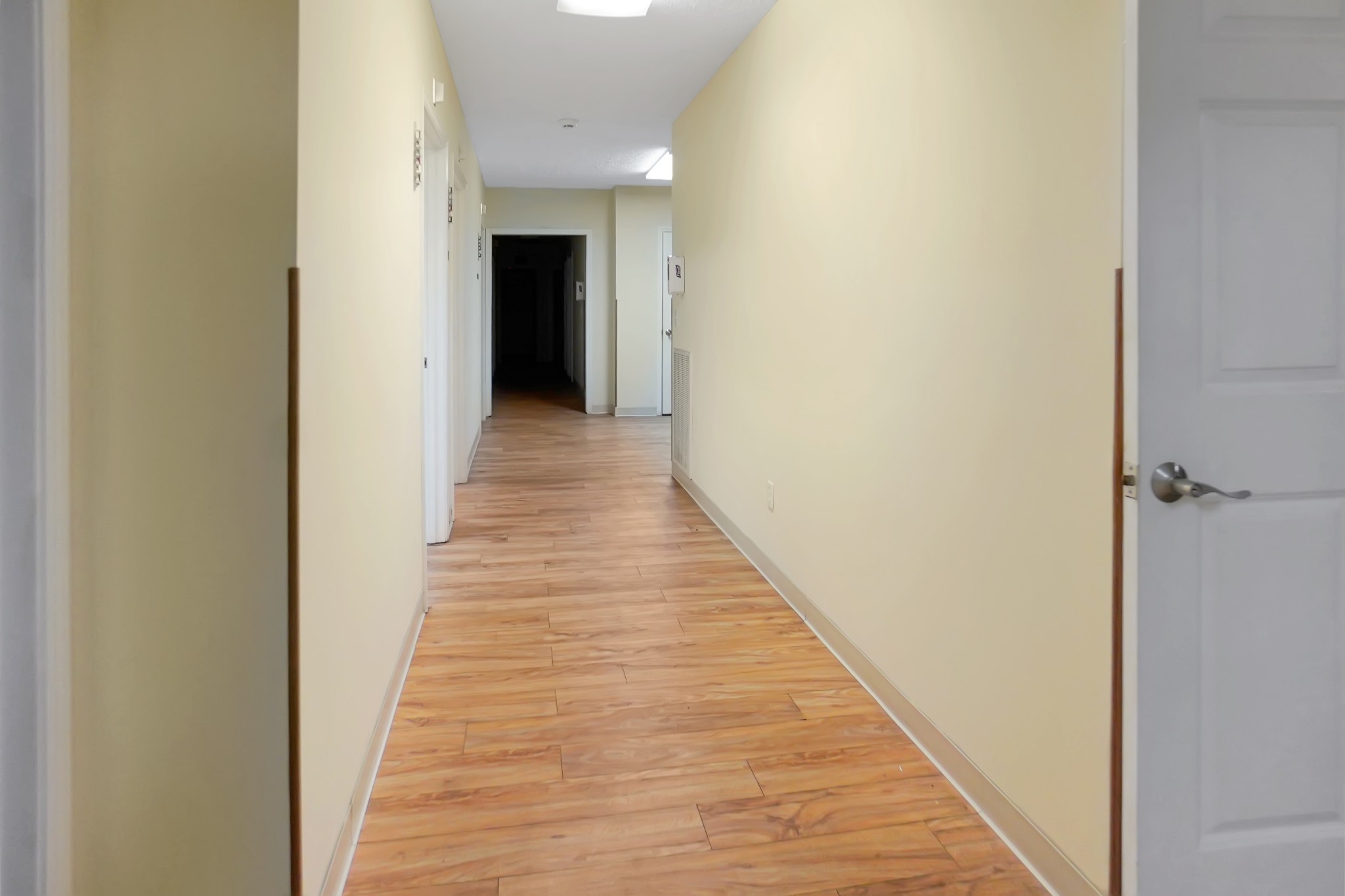 1225 Spring Street Dover, TN 37058 - Photo 8 of 47 a view of a hallway with wooden floor