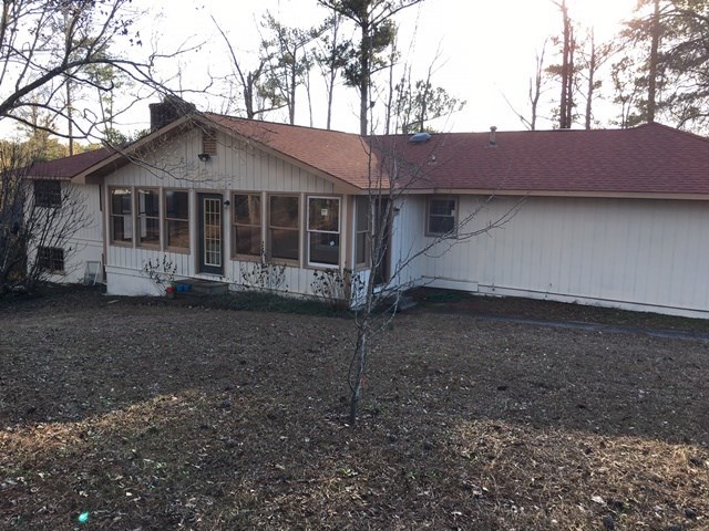 6445 Stapleton Road Macon, GA 31206 - Photo 17 of 22 a view of a house with a yard