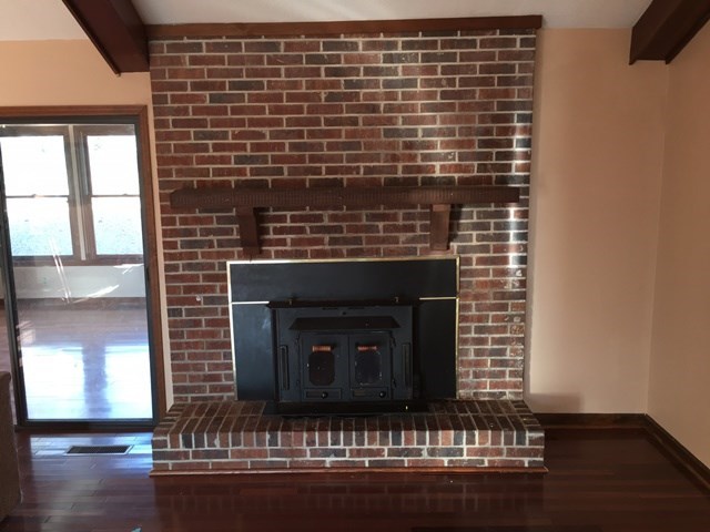 6445 Stapleton Road Macon, GA 31206 - Photo 7 of 22 a living room with a fireplace