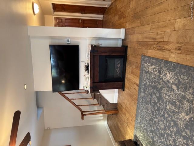 82 Westcott Street Inwood, NY 11096 - Photo 16 of 24 a view of living room with furniture and flat screen tv