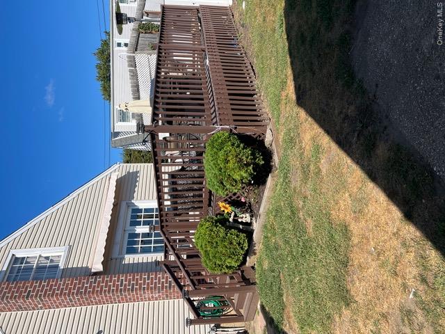 82 Westcott Street Inwood, NY 11096 - Photo 22 of 24 a view of a house with backyard and sitting area