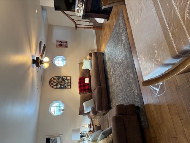 82 Westcott Street Inwood, NY 11096 - Photo 7 of 24 a living room with couches and kitchen view