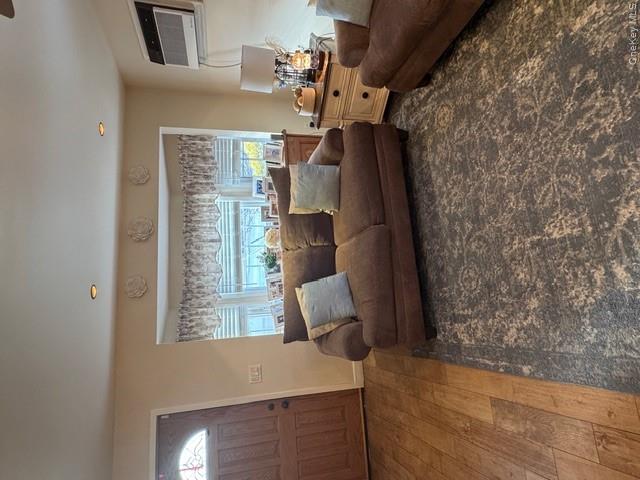 82 Westcott Street Inwood, NY 11096 - Photo 8 of 24 a living room with furniture and a large window