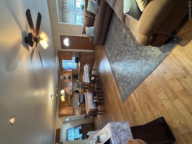 82 Westcott Street Inwood, NY 11096 - Photo 9 of 24 a living room with furniture and a chandelier