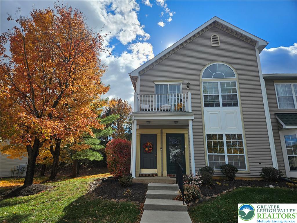 1876 Mansfield Street Hellertown, PA 18055 - Photo 1 of 19 a front view of a house with a yard