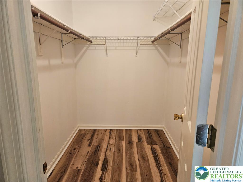 1876 Mansfield Street Hellertown, PA 18055 - Photo 17 of 19 a bathroom with a shower and a wooden floor