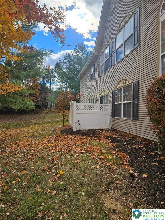 1876 Mansfield Street Hellertown, PA 18055 - Photo 18 of 19 a backyard of a house with lots of green space