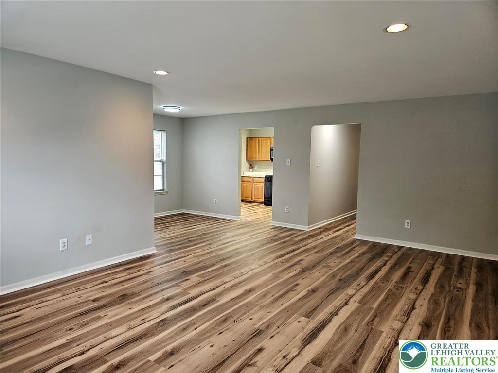 1876 Mansfield Street Hellertown, PA 18055 - Photo 6 of 19 a view of an empty room and wooden floor