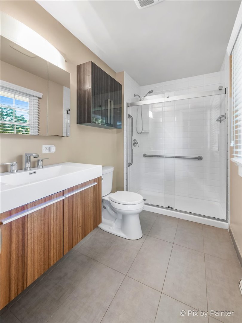 838 East Harriet Lane Barrington, IL 60010 - Photo 14 of 33 a bathroom with a sink a toilet and shower