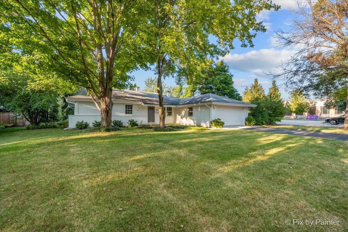 838 East Harriet Lane Barrington, IL 60010 - Photo 30 of 33 a front view of house with yard and green space