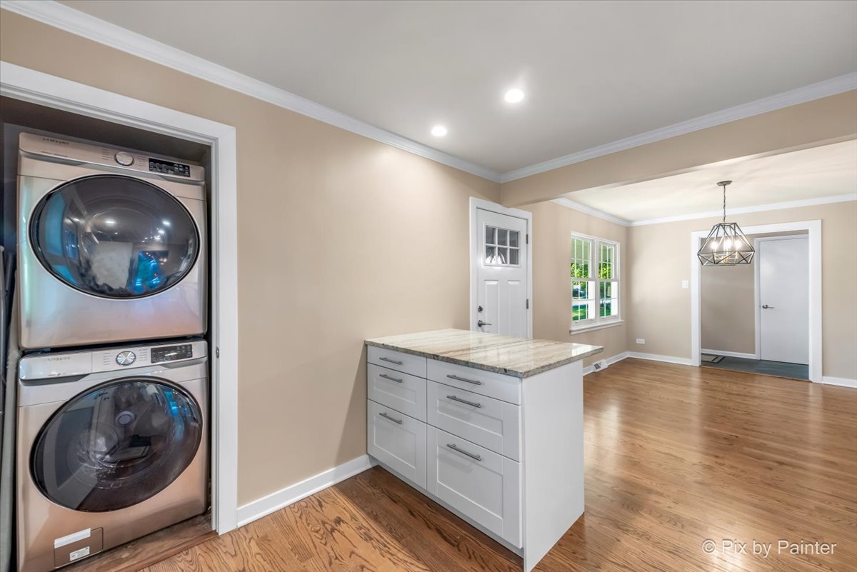838 East Harriet Lane Barrington, IL 60010 - Photo 5 of 33 a view of a kitchen with a washer and dryer