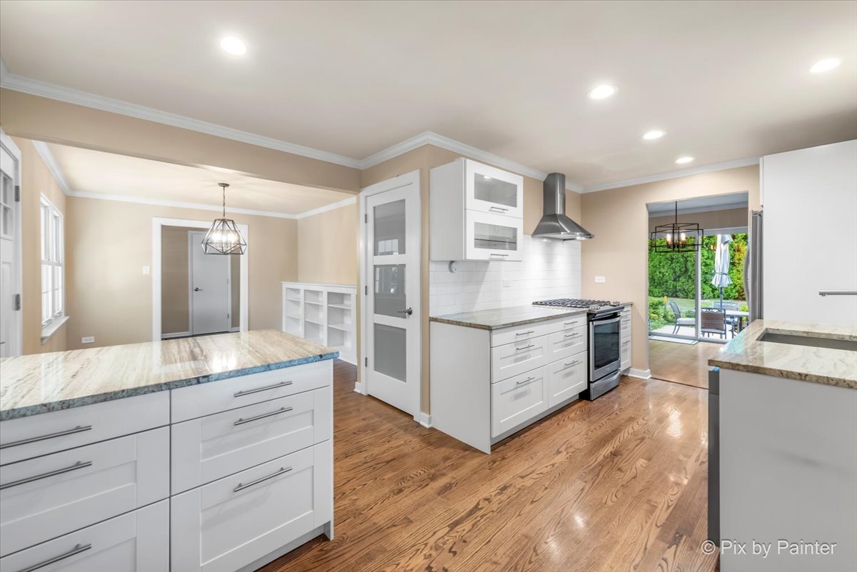 838 East Harriet Lane Barrington, IL 60010 - Photo 6 of 33 a bathroom with a double vanity sink and mirror