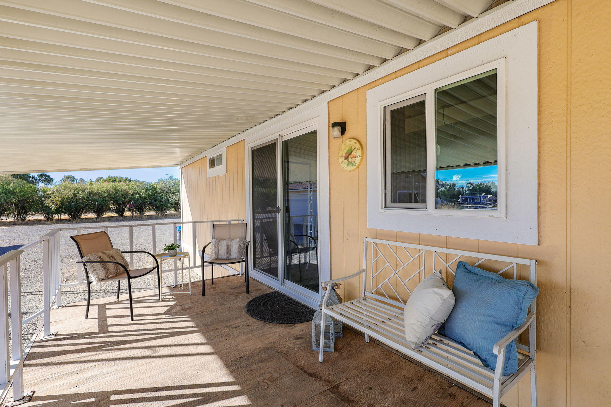 4582 Hall Road Corning, CA 96021 - Photo 33 of 71 a balcony with furniture and a potted plant