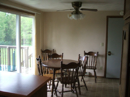 1038 Drexel Road Lake Summerset, IL 61019 - Photo 3 of 4 a view of a dining room with furniture window and outside view