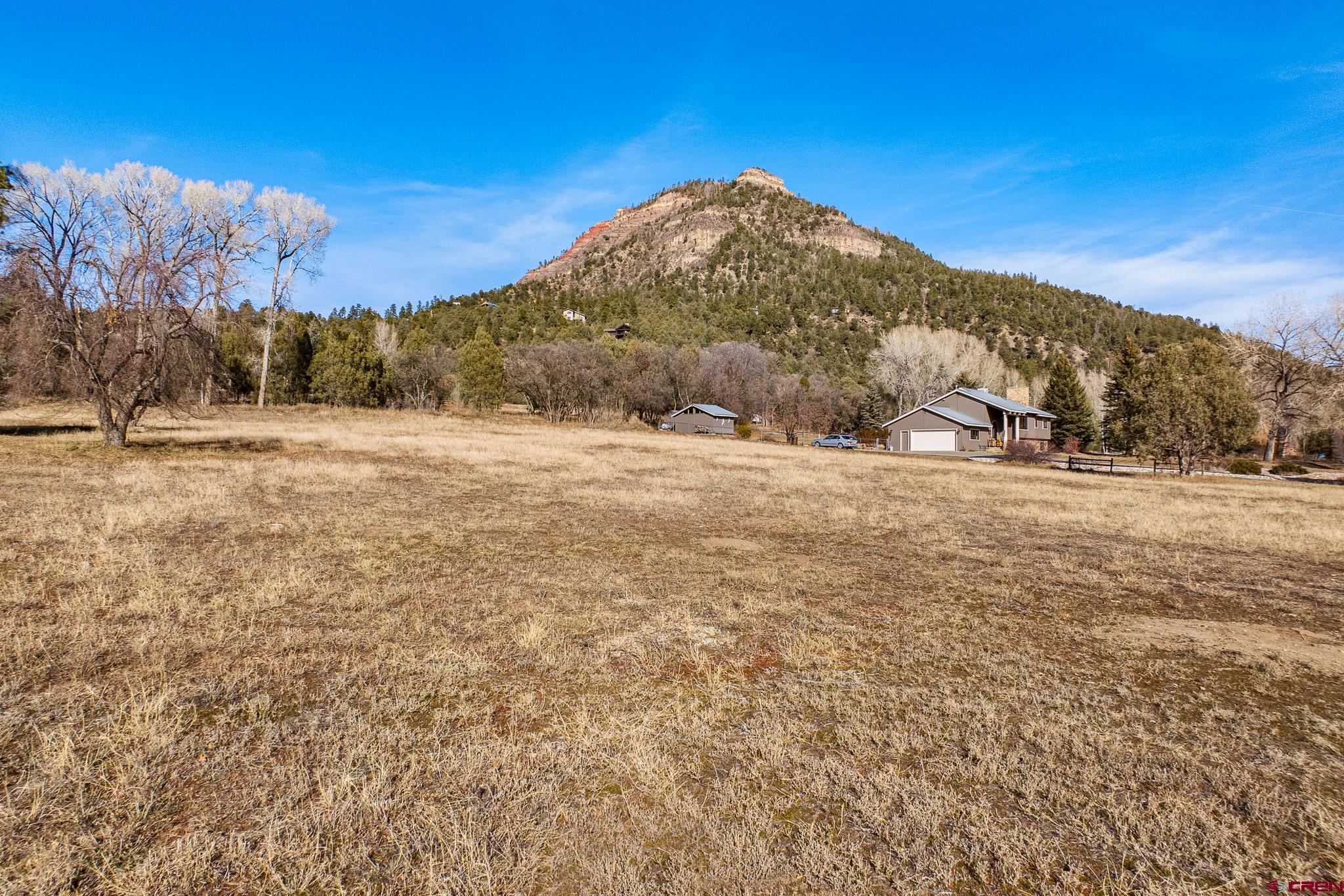 5 County Road 201 Durango, CO 81301 - Photo 23 of 26 a view of large mountain with sunset in background