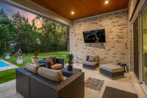 a outdoor living space with furniture and garden view