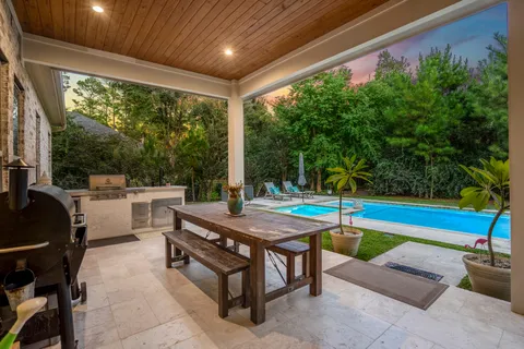 a outdoor space with swimming pool and furniture