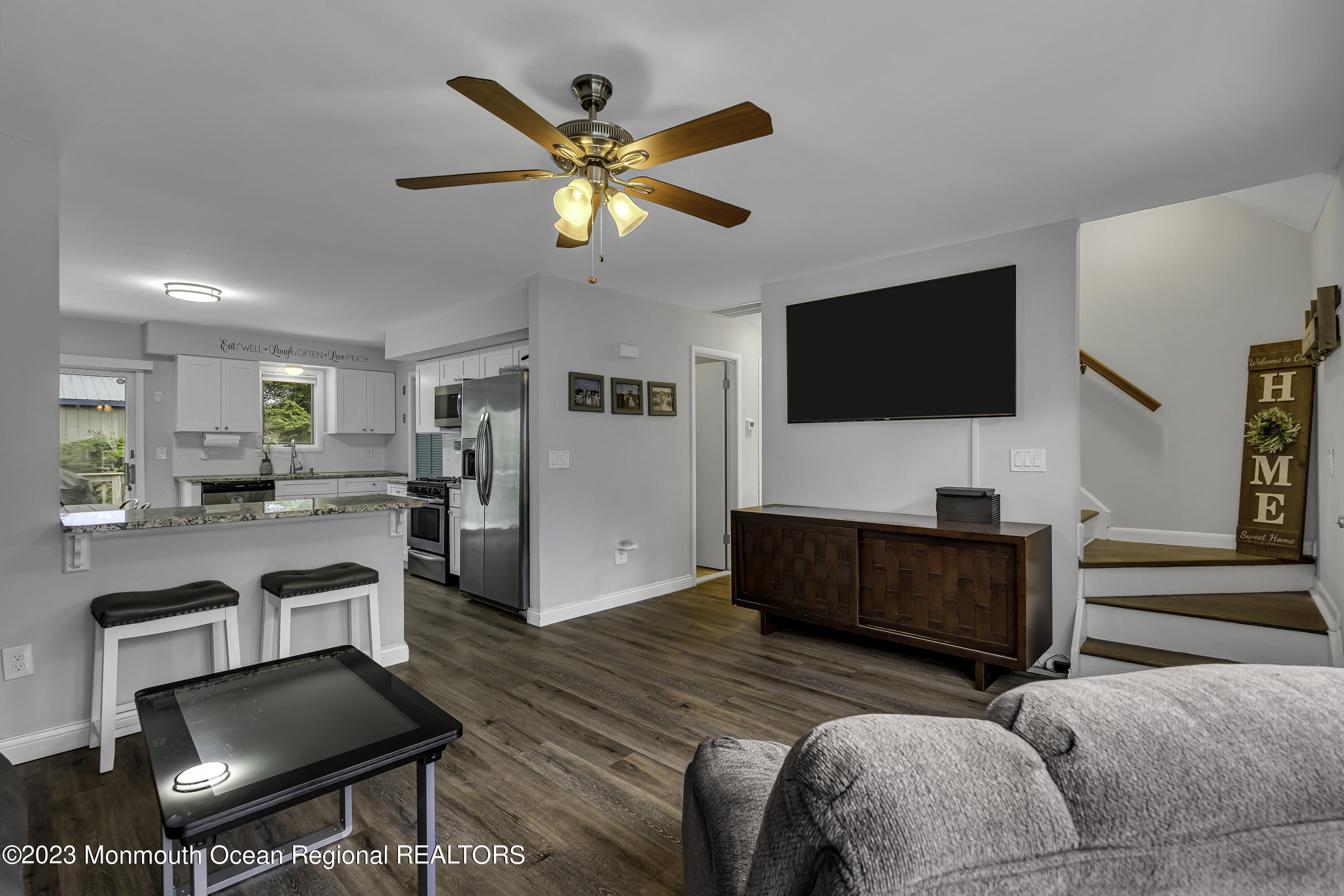 50 Central Avenue Waretown, NJ 08758 - Photo 12 of 35 a living room with furniture and a flat screen tv