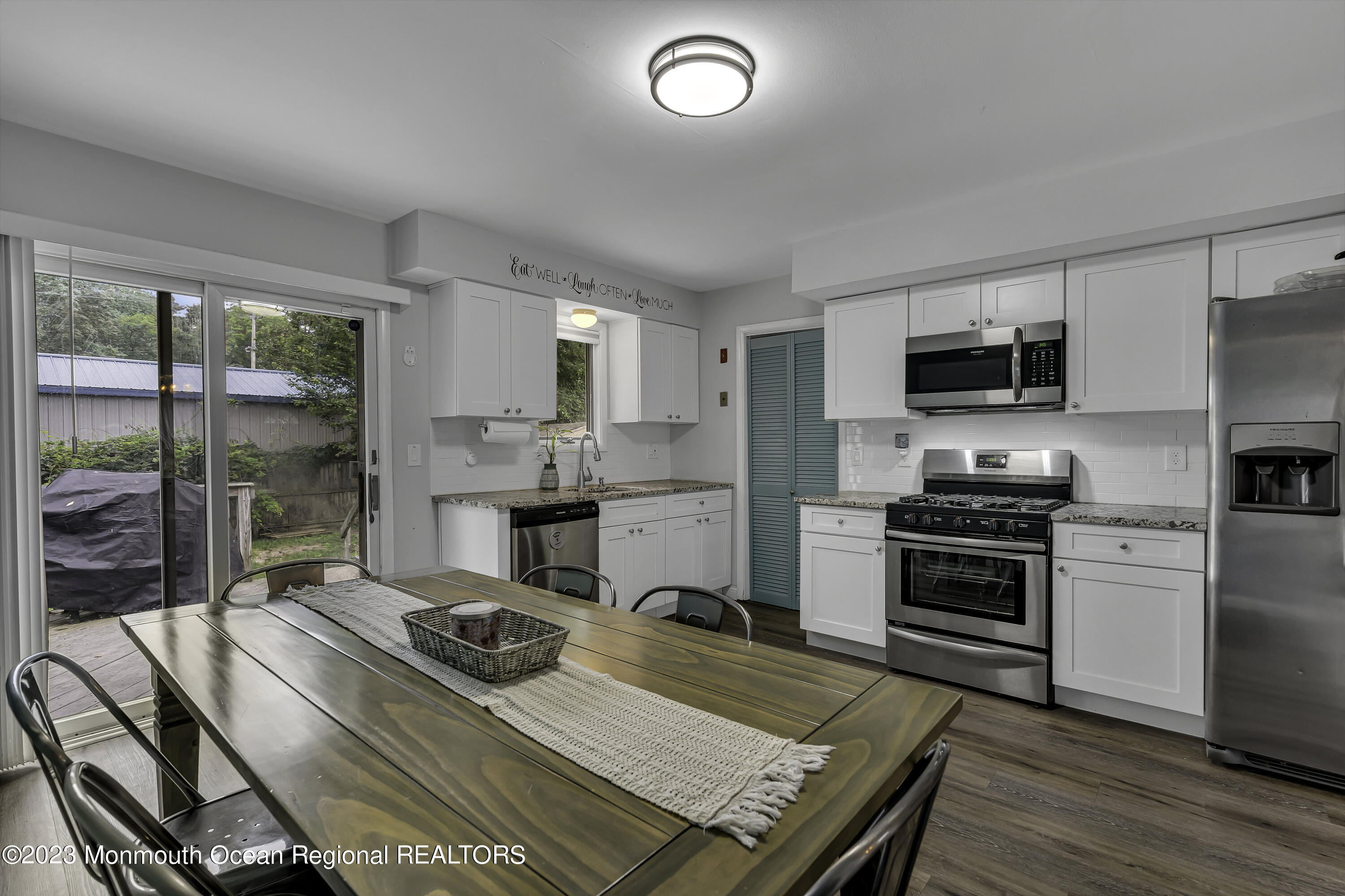 50 Central Avenue Waretown, NJ 08758 - Photo 15 of 35 a kitchen with a stove a sink and a refrigerator