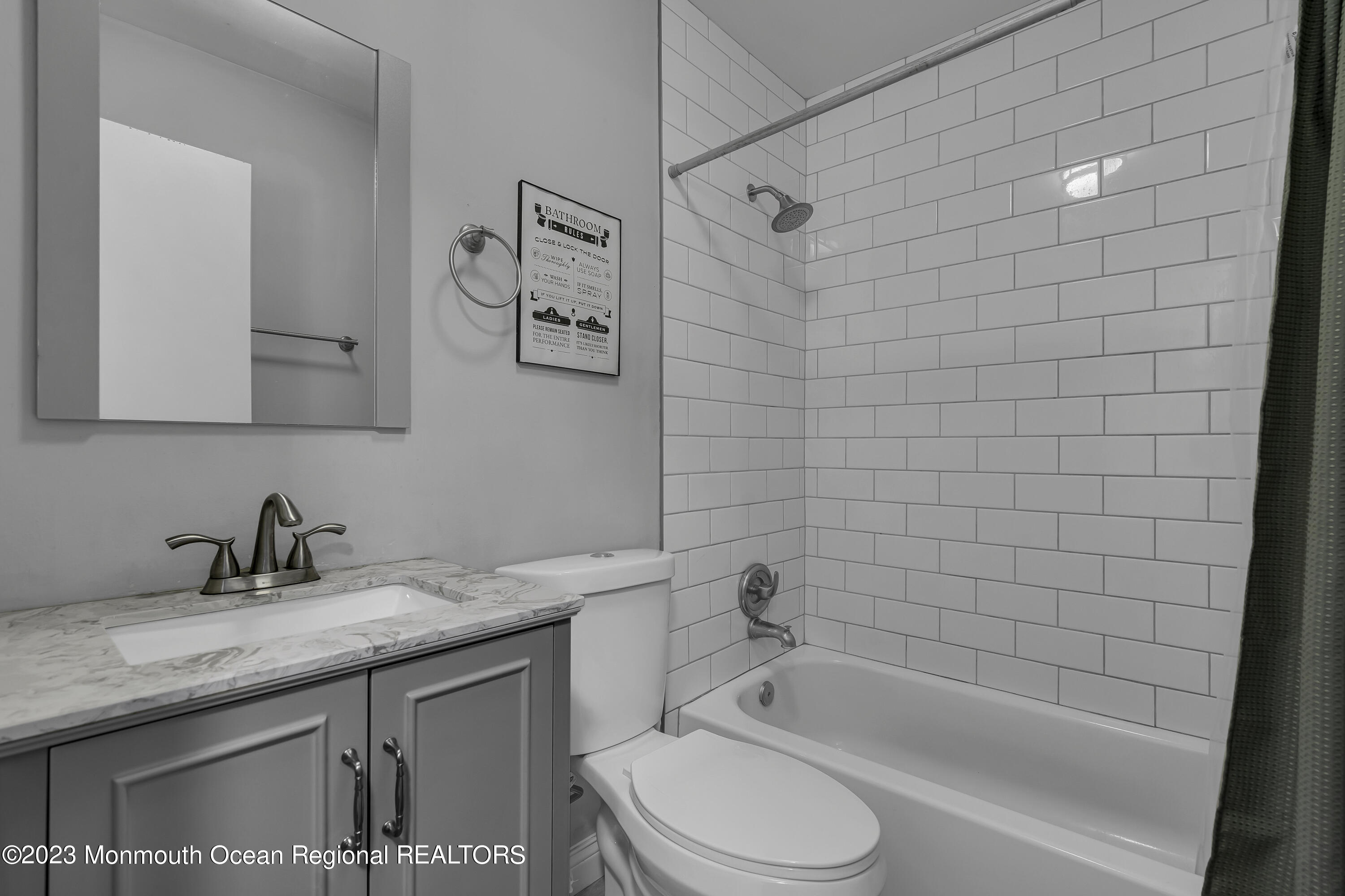 50 Central Avenue Waretown, NJ 08758 - Photo 19 of 35 a bathroom with a granite countertop sink toilet and bathtub