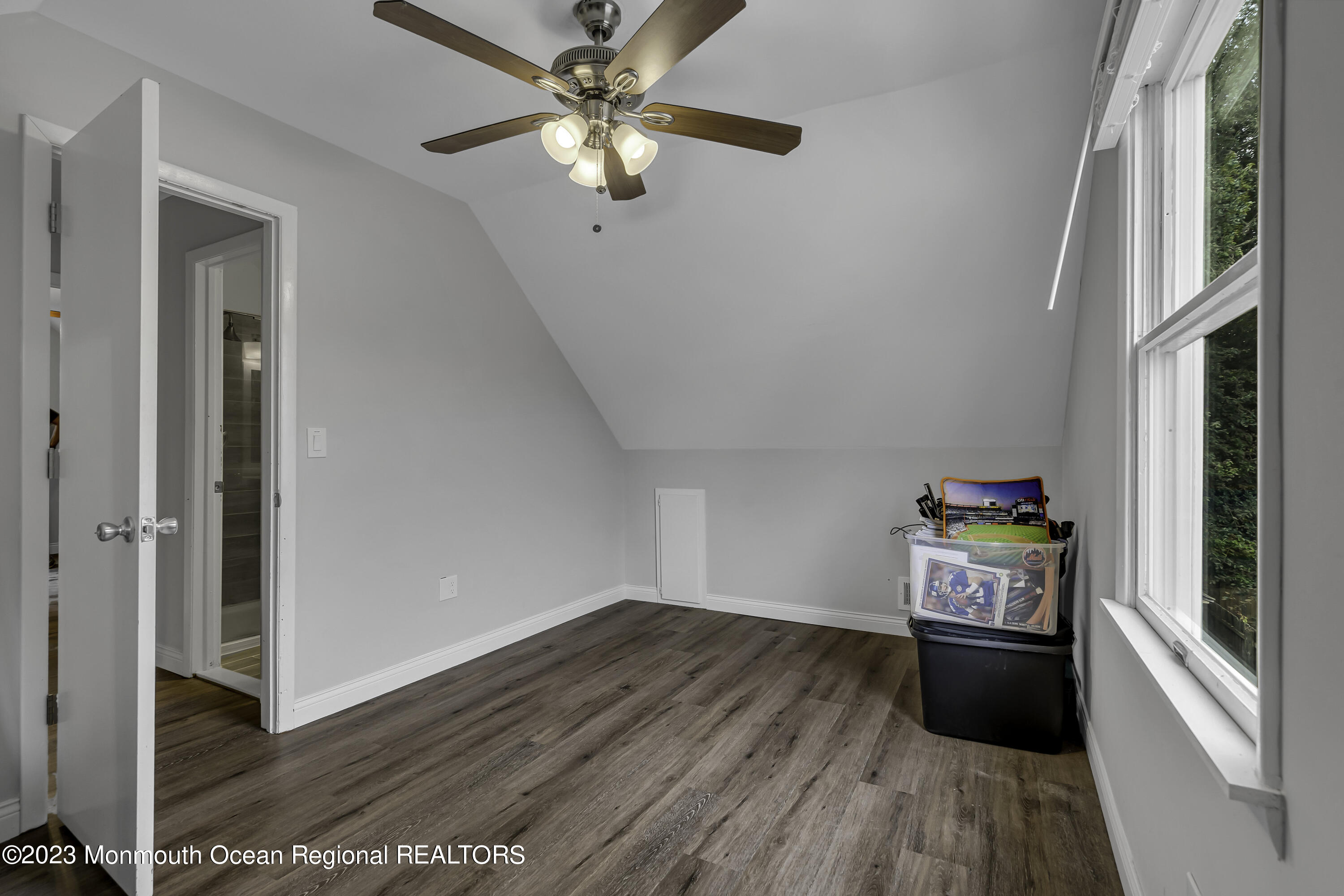 50 Central Avenue Waretown, NJ 08758 - Photo 28 of 35 wooden floor in an empty room with a window