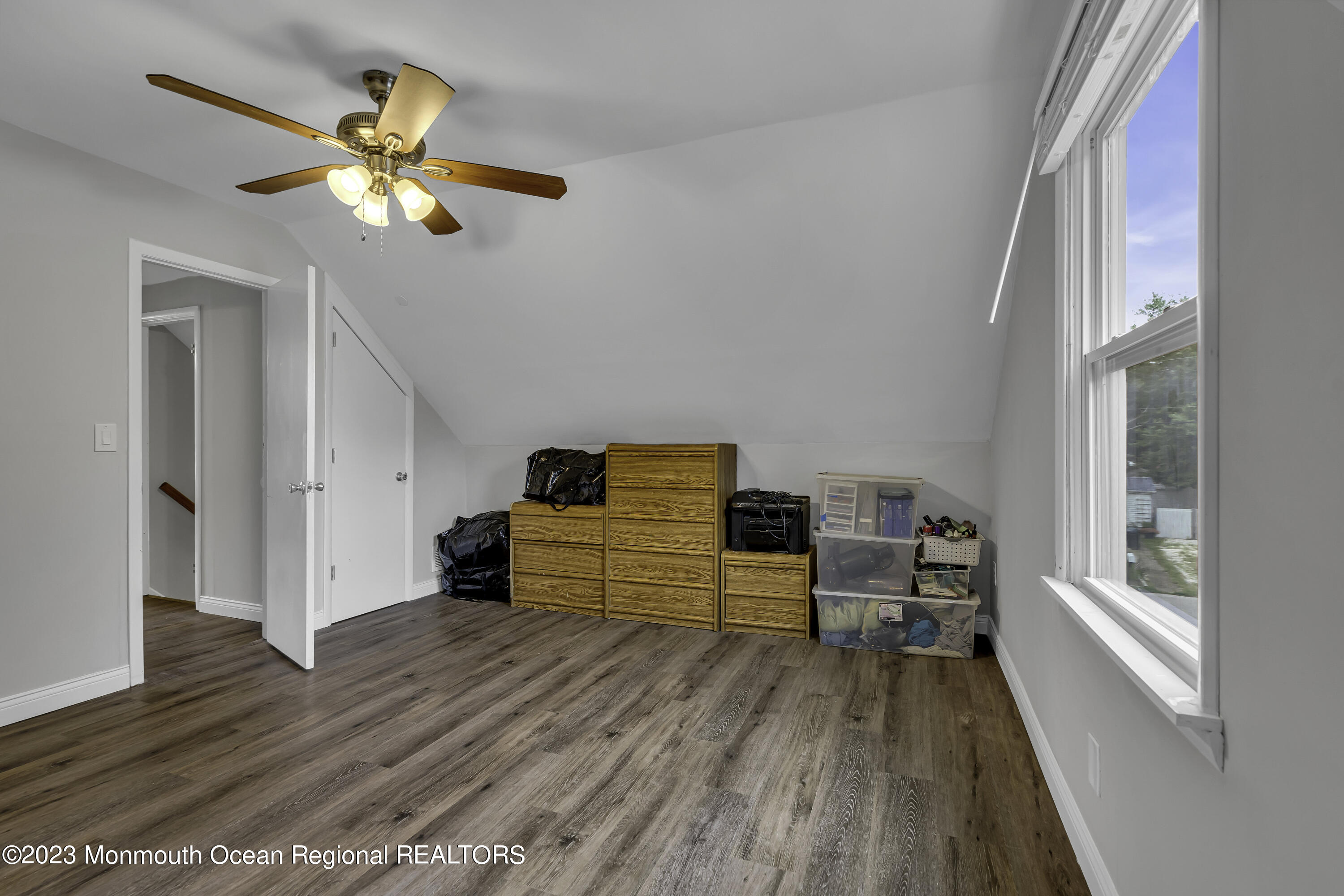50 Central Avenue Waretown, NJ 08758 - Photo 30 of 35 a bedroom with furniture and wooden floor