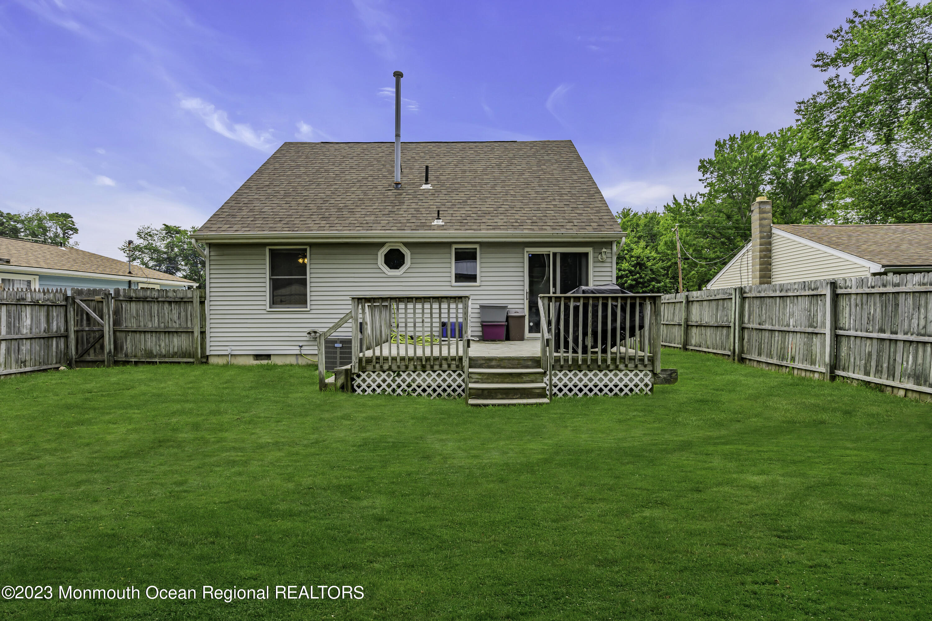 50 Central Avenue Waretown, NJ 08758 - Photo 34 of 35 a front view of a house with a garden