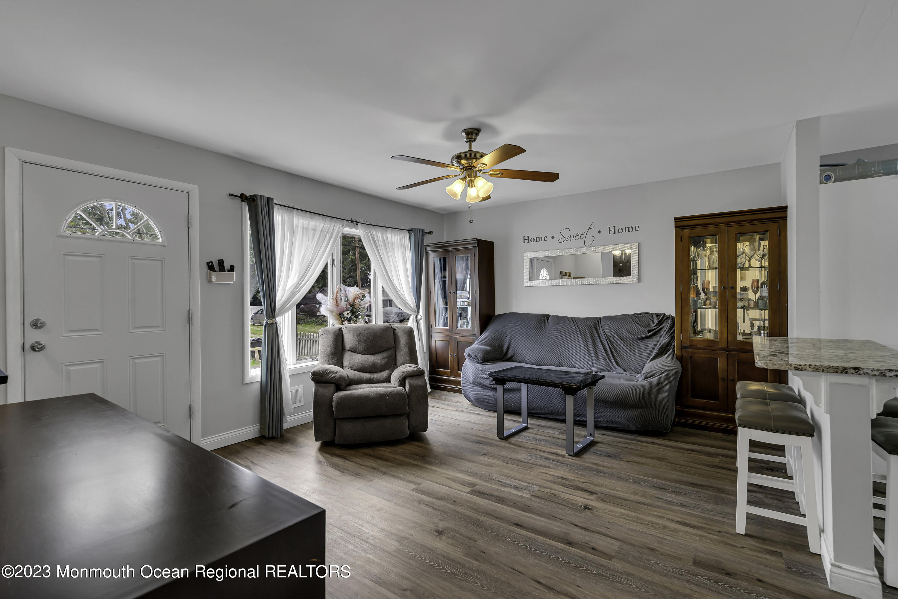 50 Central Avenue Waretown, NJ 08758 - Photo 10 of 35 a living room with furniture and a wooden floor