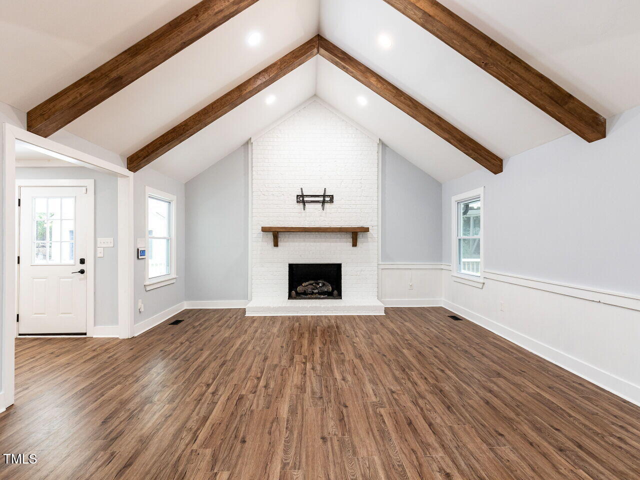 5704 Baird Drive Raleigh, NC 27606 - Photo 3 of 43 008-1280x960-family-room-with-fireplace