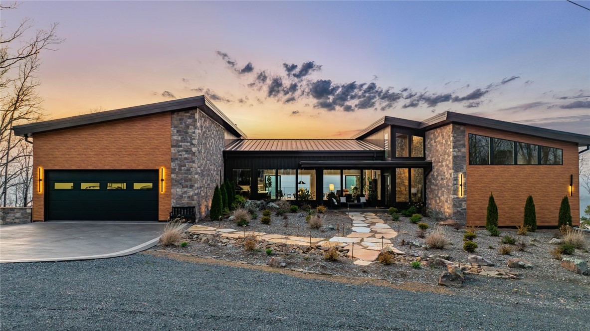 2623 Alum Cave Road Bee Branch, AR 72013 - Photo 1 of 60 Contemporary residence featuring a striking combination of stone and wood-panel siding