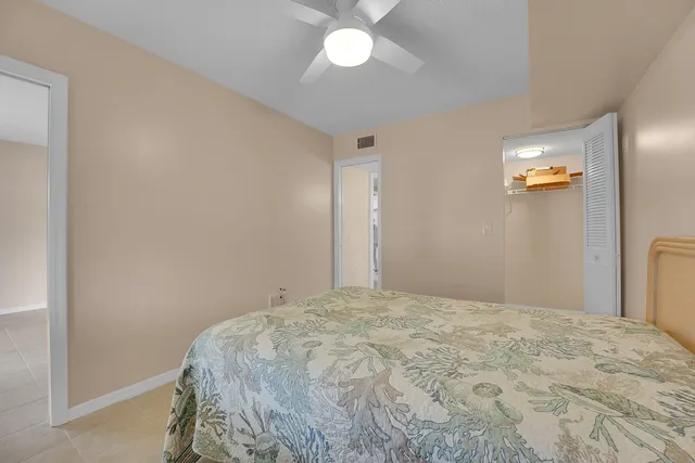 a view of a hallway with entryway wooden floor and front door