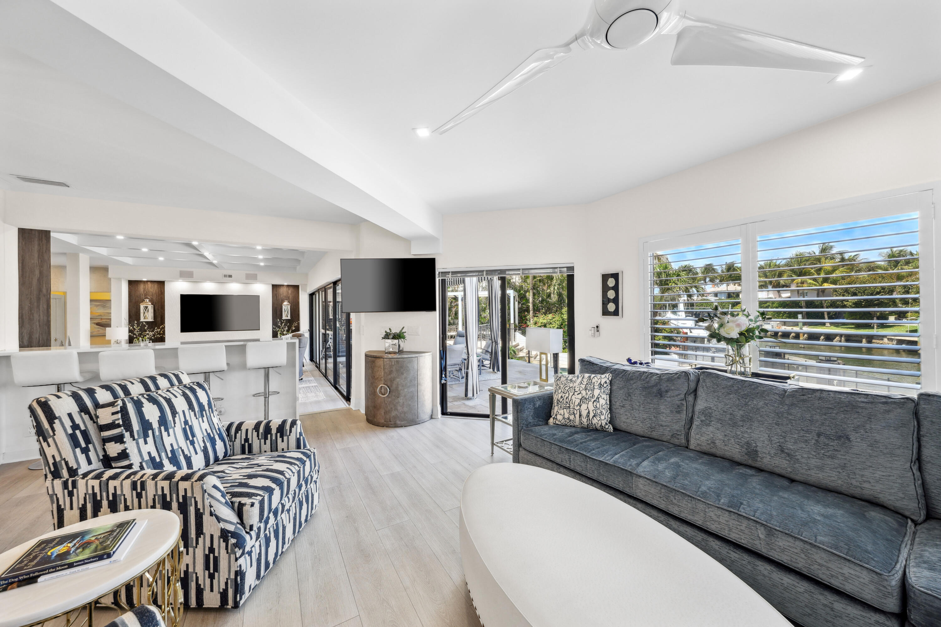 125 Marlin Drive Ocean Ridge, FL 33435 - Photo 24 of 122 a living room with furniture and a large window